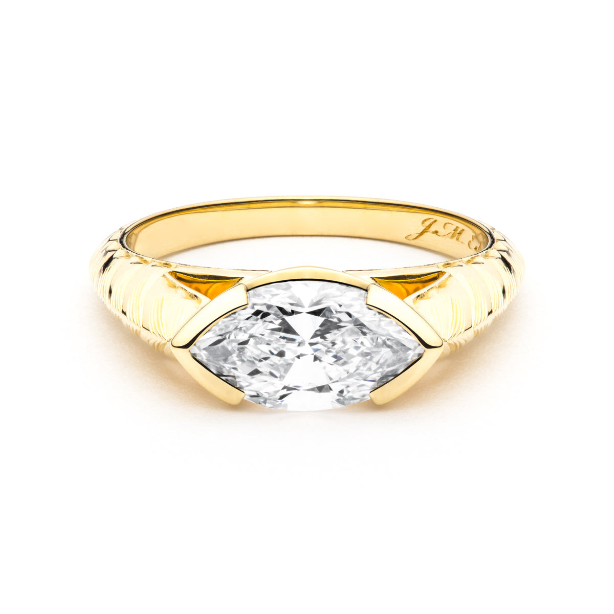 The Lirys Hand Engraved Marquise Engagement Ring