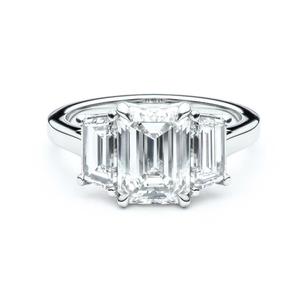 Emerald Cut and Trapezoid Three Stone Engagement Ring