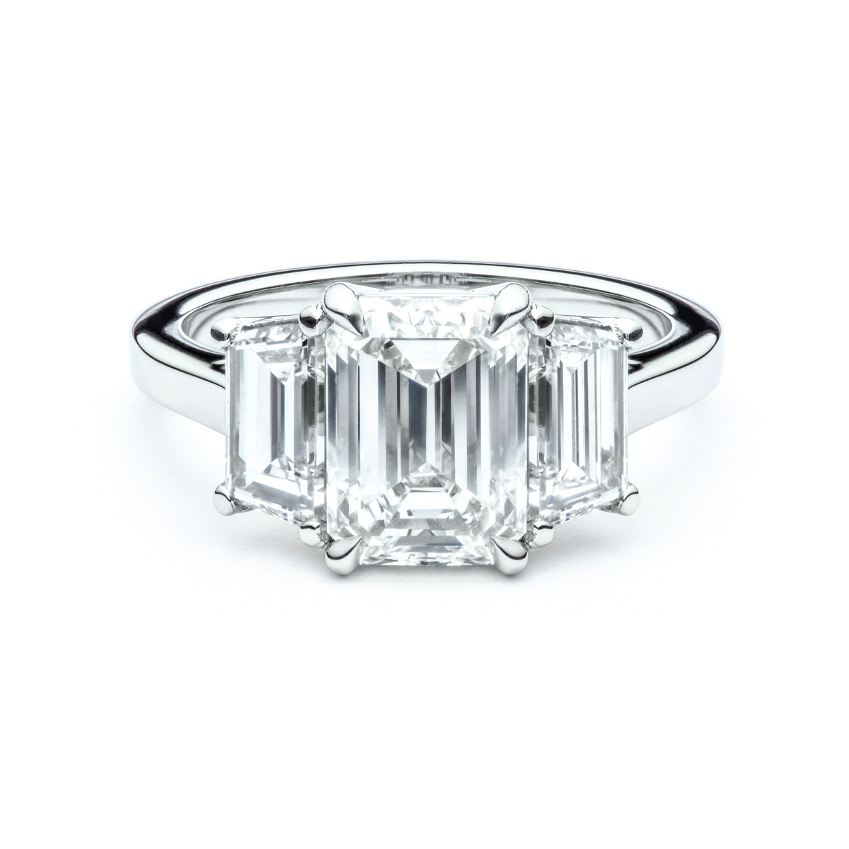 Emerald Cut and Trapezoid Three Stone Engagement Ring